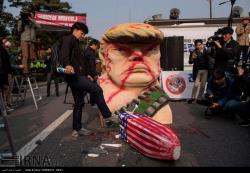 کره جنوبی / ادامه اعتراضات مردمی علیه سفر ترامپ به سئول