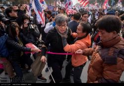 کره جنوبی / ادامه اعتراضات مردمی علیه سفر ترامپ به سئول
